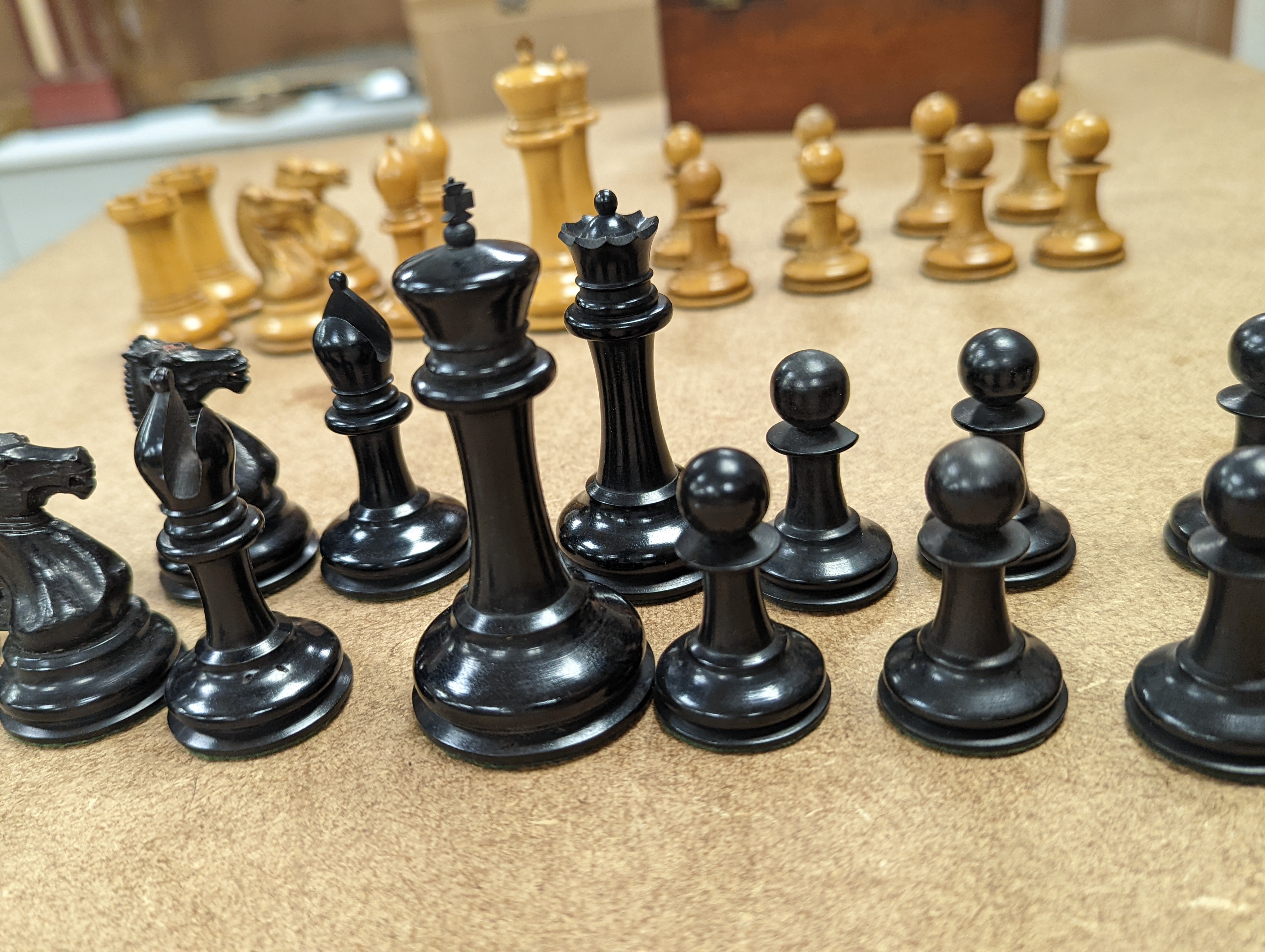 A boxed Jaques Staunton boxwood and ebony chess set, White king stamped Jaques London, 8.5cm high